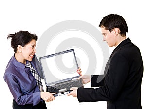 Couple fighting for laptop