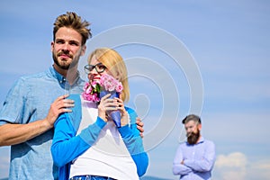 Couple with flowers bouquet romantic date. New love. Ex partner watching girl starts happy love relations. Ex husband