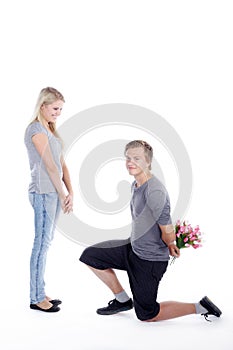 Couple with flowers and marriage proposal