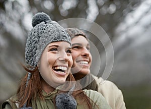 Couple, forest and happy on hiking vacation in outdoors, love and bonding in relationship for connection. People