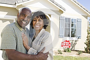 Couple In Front Of Home For Sale