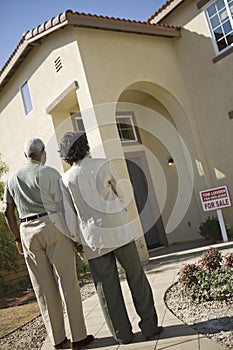 Couple In Front Of House For Sale