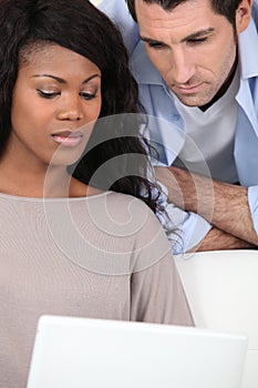 Couple in front of laptop