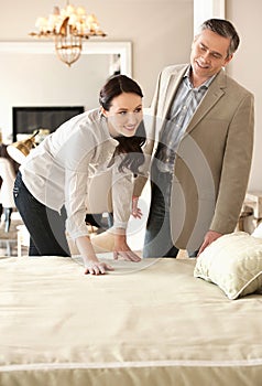 Couple in furniture store.