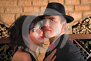 Couple in gangster costumes