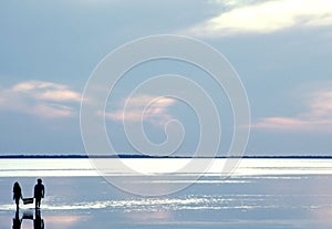 Couple Gathering Clams