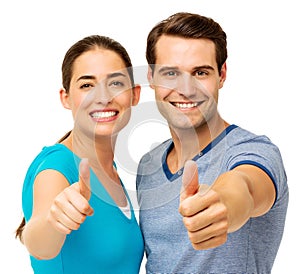 Couple Gesturing Thumbs Up Over White Background