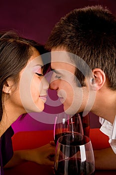 Couple Getting Closer While Having Wine
