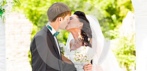 Couple Getting Married at an Outdoor Wedding Ceremony