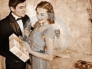 Couple with gift box. Black and white retro