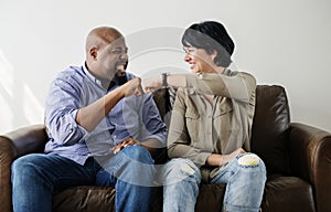 Couple giving fist bump to each other
