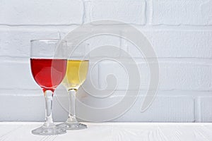 Couple glasses with red and white wine for tasting