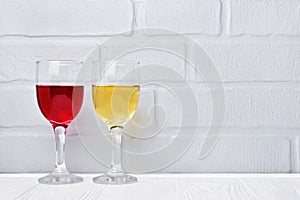 Couple glasses with red and white wine for tasting