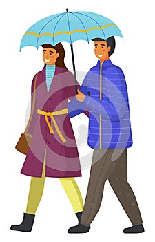 Couple goes in rain. Happy man and woman are walking in city park under an umbrella isolated