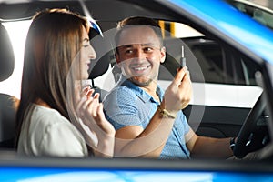 Couple is going to buy new car.