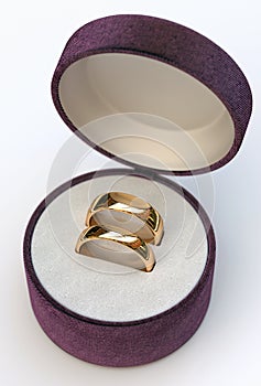 Couple of gold wedding rings in jewelry white box