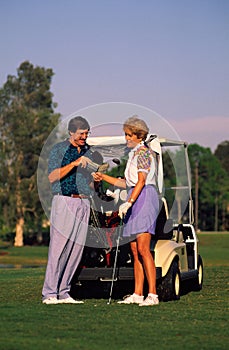 Couple Golfing