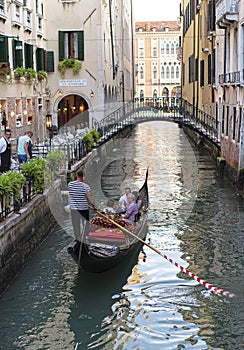 A couple in a gondola in Venice, Italy