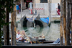 Couple in gondola in Venice