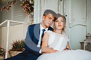 Couple groom and bride against the background studio