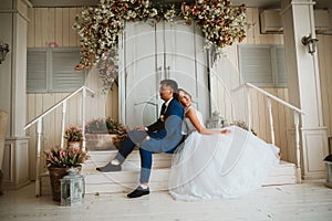 Couple groom and bride against the background studio