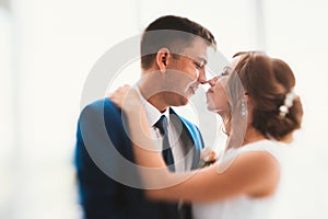 Couple groom and bride against the background studio