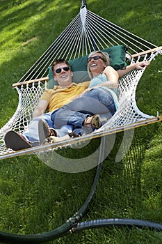 Couple in hammock laughing