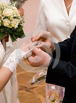 Couple hands at wedding ceremony