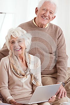 Elder people uses computer photo