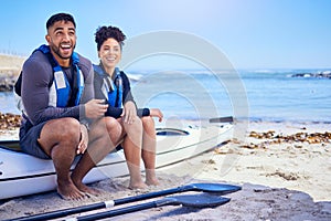 Couple, happy and outdoor for kayak or travel at a beach with a partner for teamwork. A man and woman with a canoe for