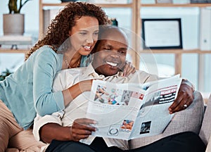 Couple, happy and reading newspaper in home, living room and check article information. Man, woman and smile in house