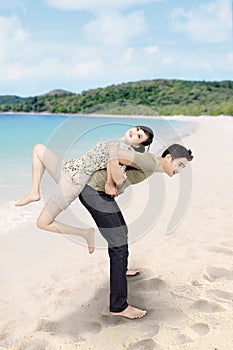 Couple have fun at beach