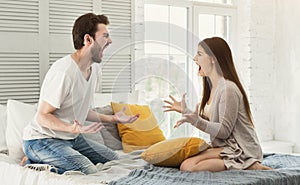 Couple having argument in bedroom