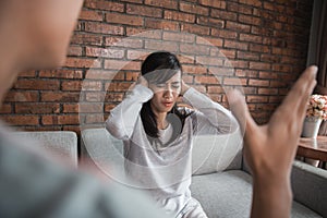 Couple having argument on the couch