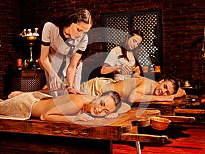 Couple having Ayurvedic spa treatment