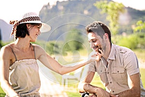 Couple having a bicycles ride into the nature