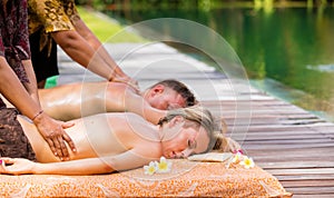 Couple having body massage