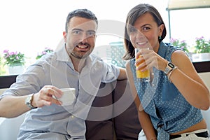 Couple having breakfast in hotel during vacations