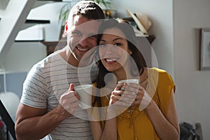 Couple having coffee at home