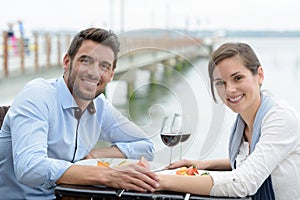 Couple having dinner outdoors