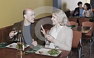 Couple having dinner at restaurant