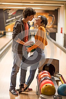 Couple having fun in bowling alley. Love and romance