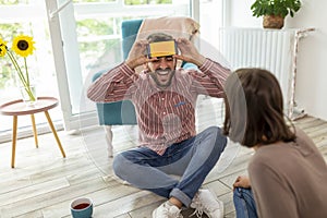 Couple playing a word guessing game photo