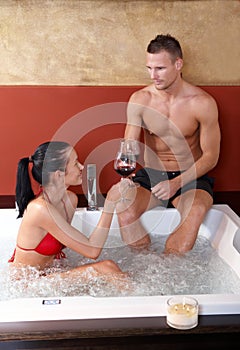 Couple having fun in jacuzzi