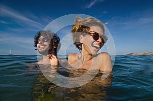 Couple having fun in the sea