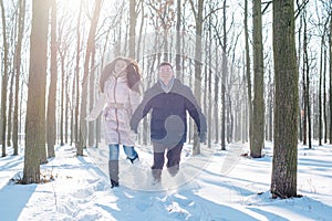 Couple having fun in snowy park