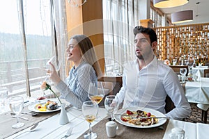 Couple having lunch at rustic gourmet restaurant