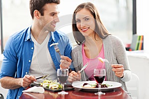 Couple having meal in restaurant