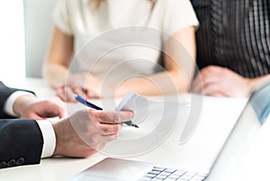 Couple having meeting with legal advisor, real estate agent.