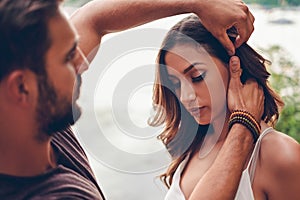 Couple having problem while sitting in nature